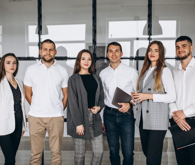 Group of people working out business plan in an office